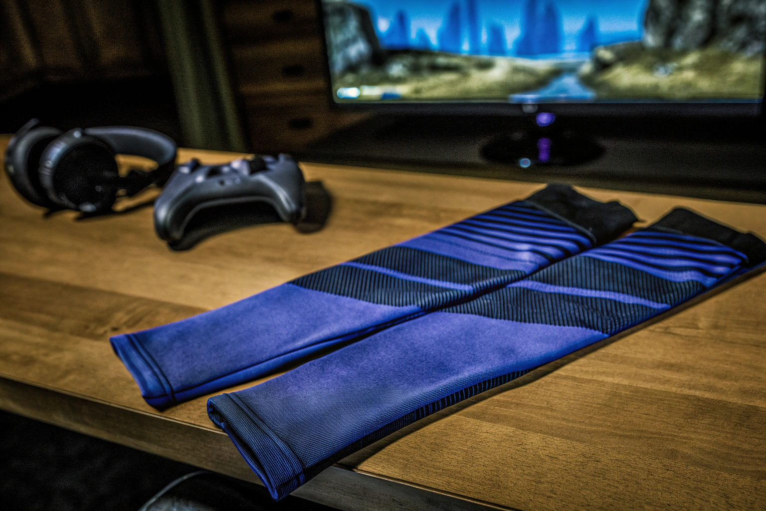 Ein Paar Armsleeves, die von einem Gamer getragen werden. Armsleeves für Gamer